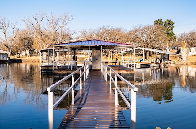 view of dock with a water view