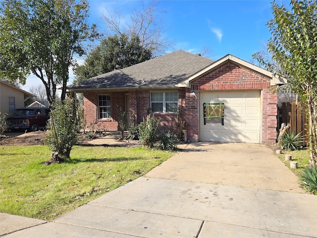 ranch-style home featuring a garage and a front yard