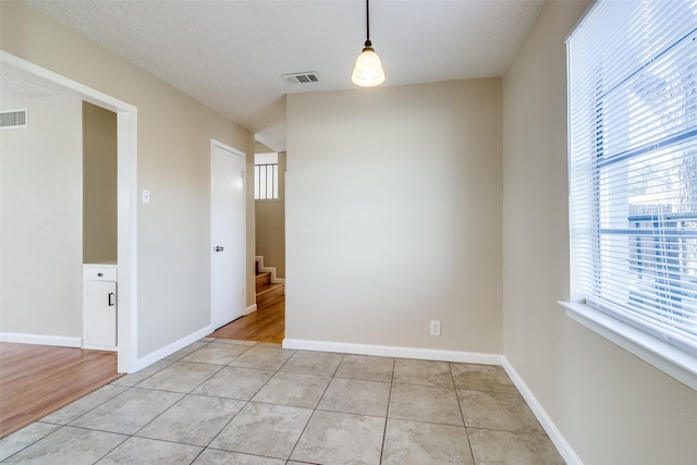 interior space featuring light tile patterned floors