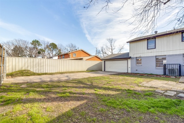 view of yard with a garage