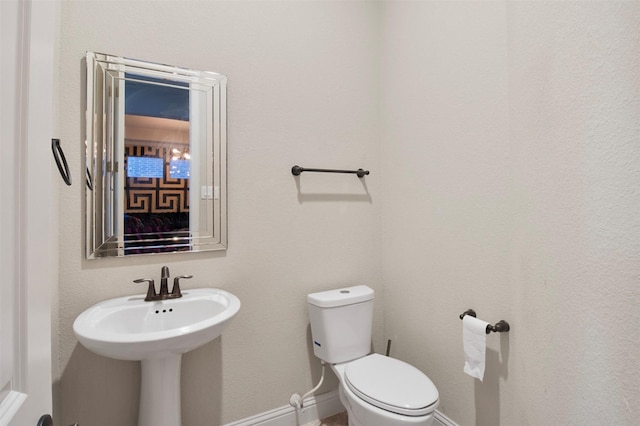 bathroom featuring toilet