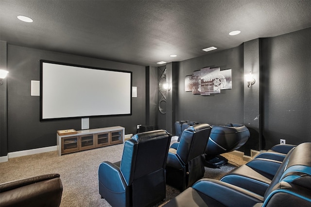 carpeted cinema featuring a textured ceiling