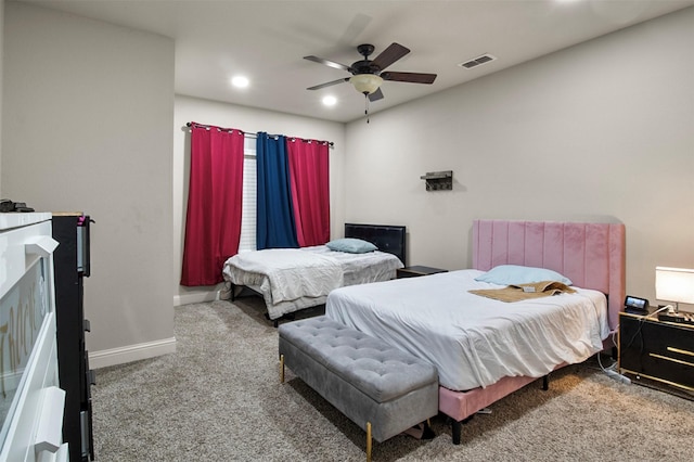 carpeted bedroom featuring ceiling fan