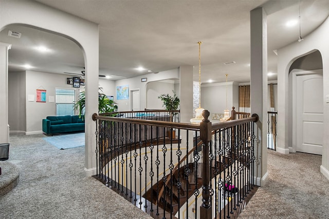 hallway featuring carpet floors