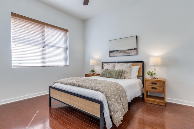 bedroom featuring ceiling fan and dark hardwood / wood-style floors