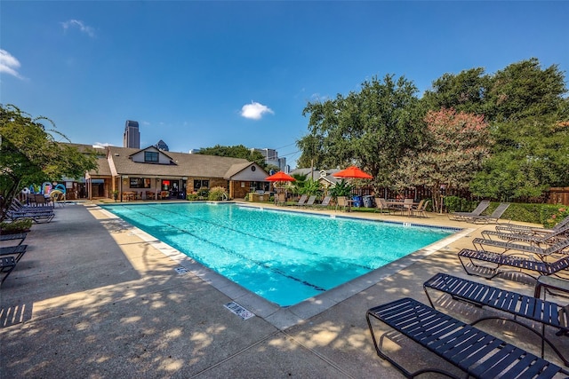 view of pool featuring a patio