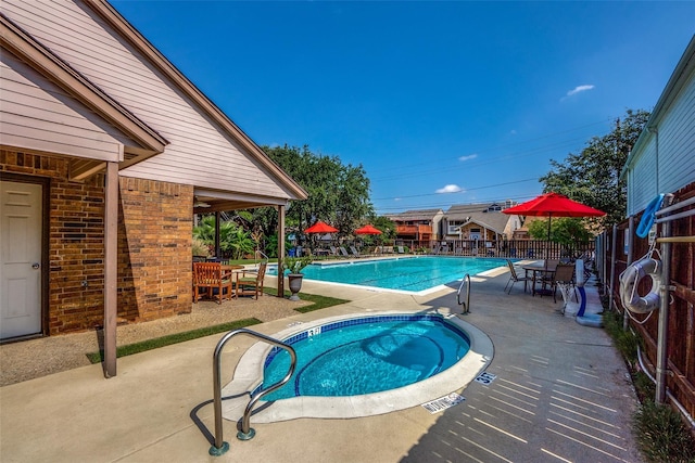 view of pool with a patio