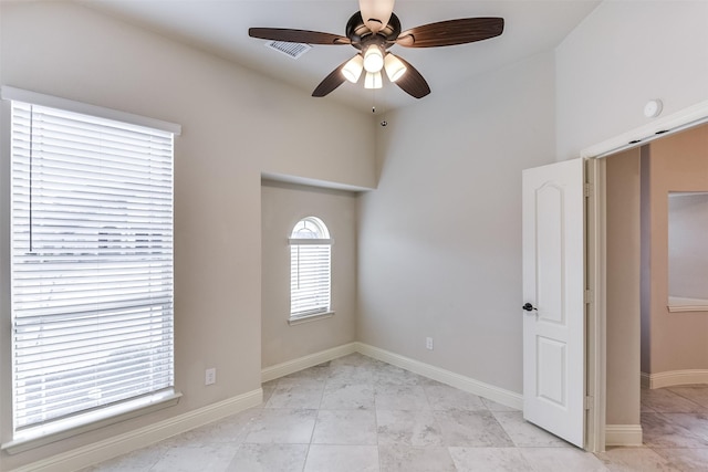 empty room featuring ceiling fan