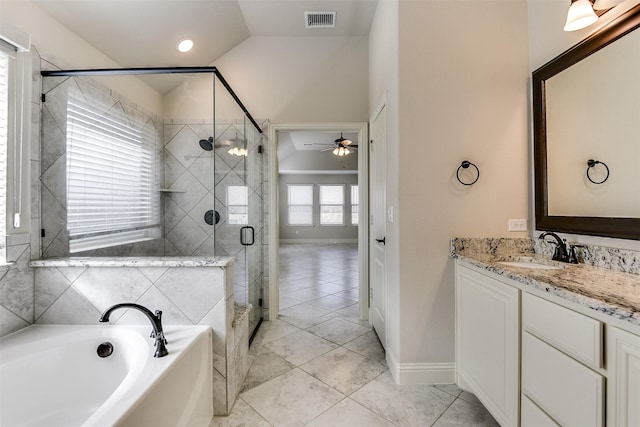 bathroom with ceiling fan, tile patterned floors, vaulted ceiling, shower with separate bathtub, and vanity