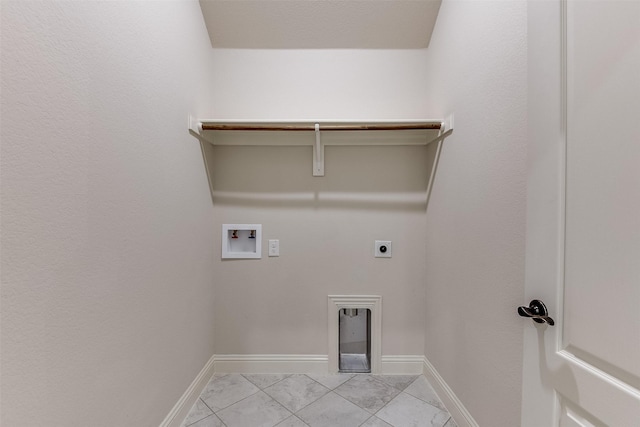 clothes washing area featuring hookup for a washing machine and electric dryer hookup