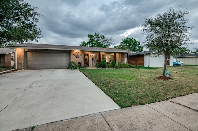 single story home with a front lawn and a garage