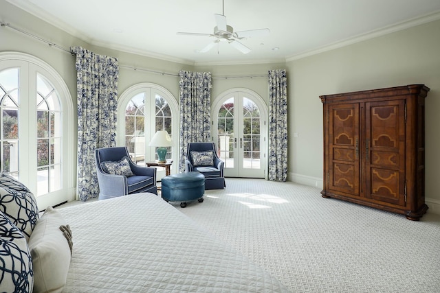 bedroom with light carpet, ceiling fan, access to exterior, french doors, and ornamental molding