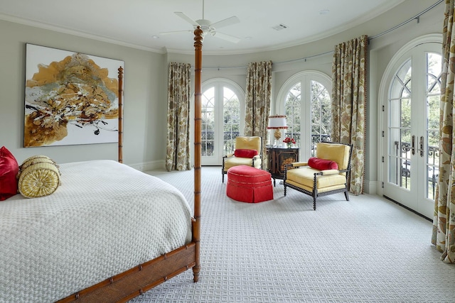 bedroom featuring ceiling fan, access to exterior, light colored carpet, french doors, and ornamental molding