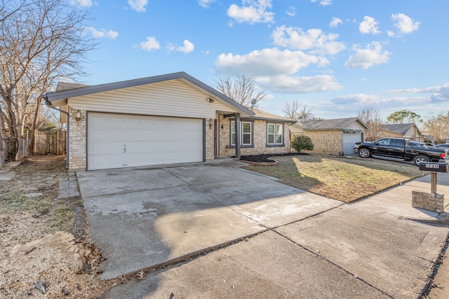 ranch-style home with a garage