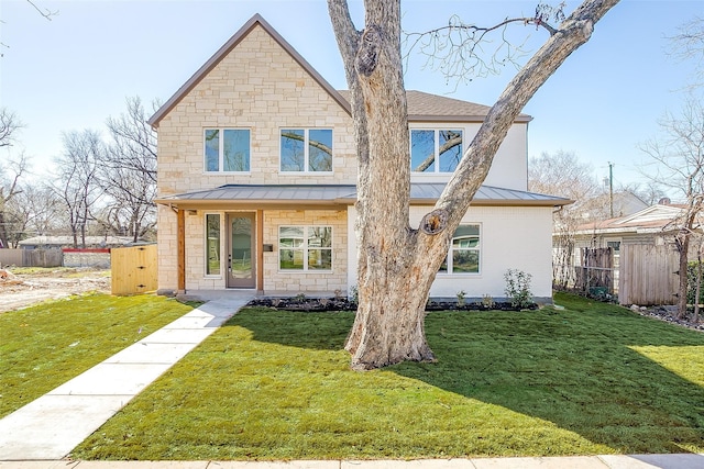 view of front of home with a front lawn