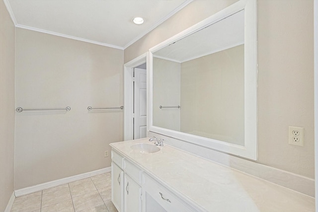 bathroom with ornamental molding, tile patterned floors, and vanity