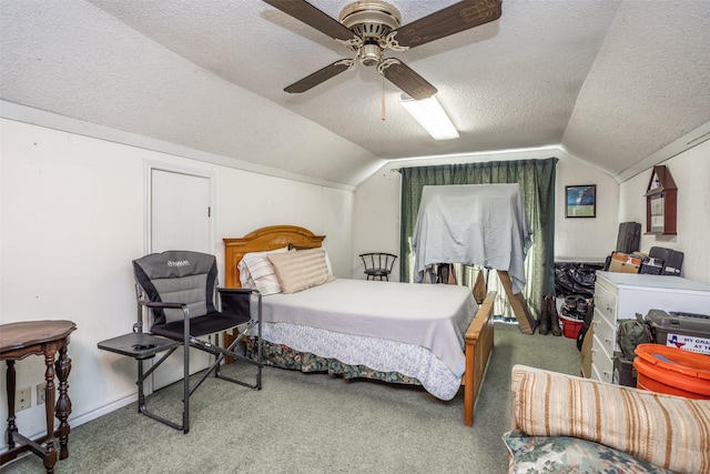 carpeted bedroom featuring a textured ceiling, ceiling fan, and vaulted ceiling