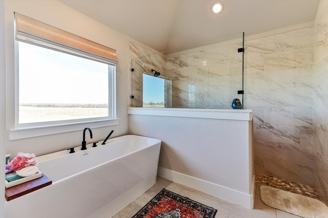 bathroom featuring tile patterned floors, plus walk in shower, and vaulted ceiling