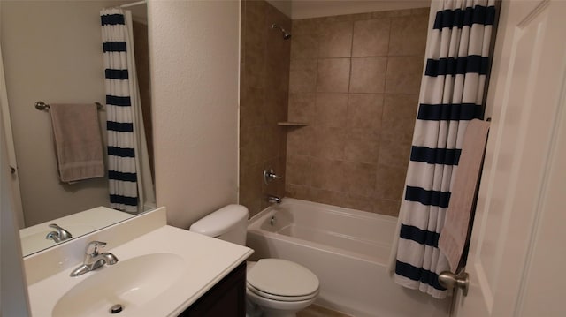 full bathroom featuring toilet, shower / bathtub combination with curtain, and vanity