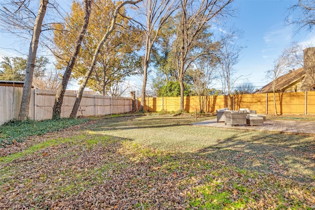 view of yard with an outdoor hangout area and a patio