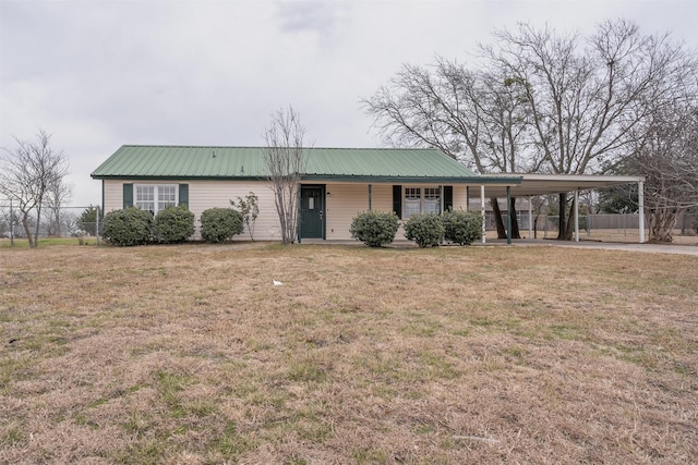 ranch-style house with a front lawn and a carport