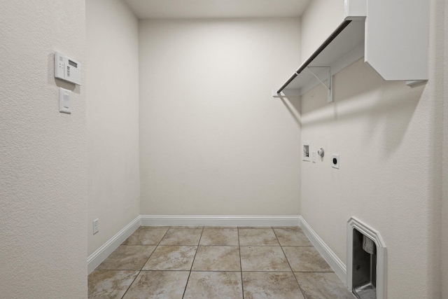 laundry area featuring light tile patterned floors, gas dryer hookup, hookup for a washing machine, and hookup for an electric dryer