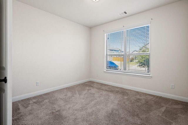 view of carpeted spare room