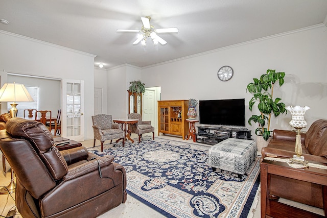 living room featuring ceiling fan and ornamental molding