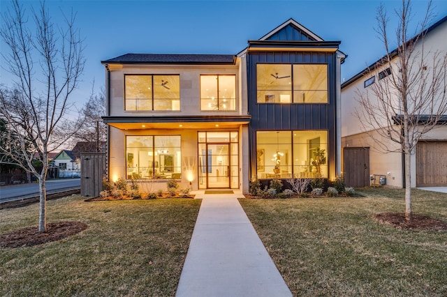 view of front of house with a yard