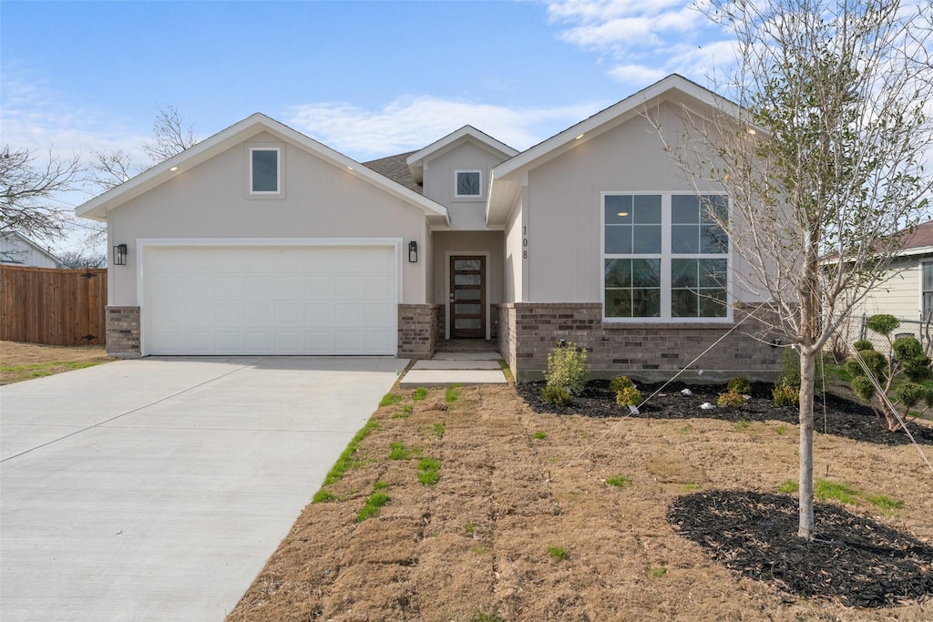 view of front of home with a garage