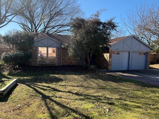 view of yard featuring a garage