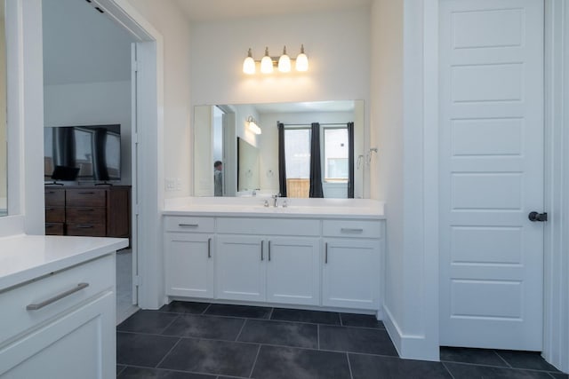 bathroom featuring vanity and tile patterned flooring