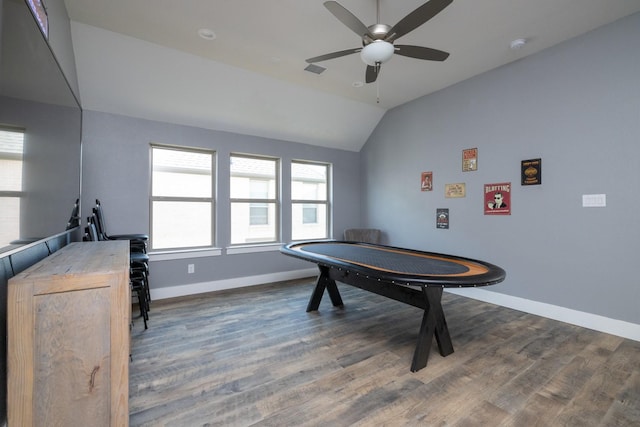 game room with dark wood-type flooring, ceiling fan, and vaulted ceiling