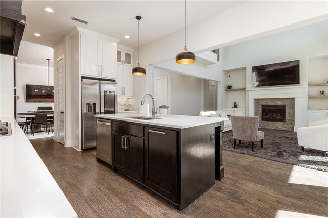 interior space with dark colored carpet and connected bathroom