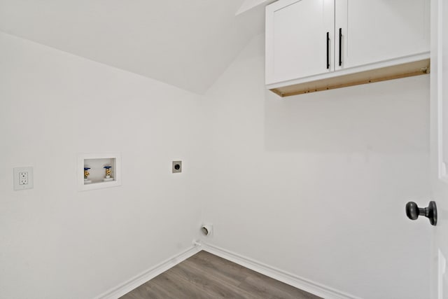 laundry room featuring washer hookup, cabinets, hookup for an electric dryer, and dark wood-type flooring