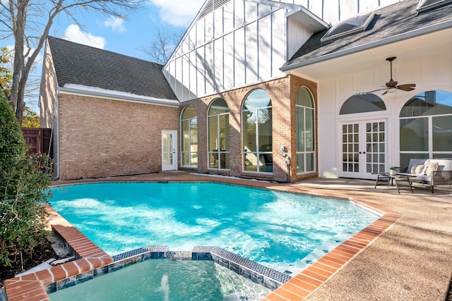 view of pool with ceiling fan, french doors, and a patio