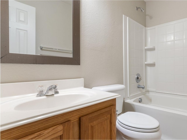 full bathroom featuring toilet, vanity, and  shower combination