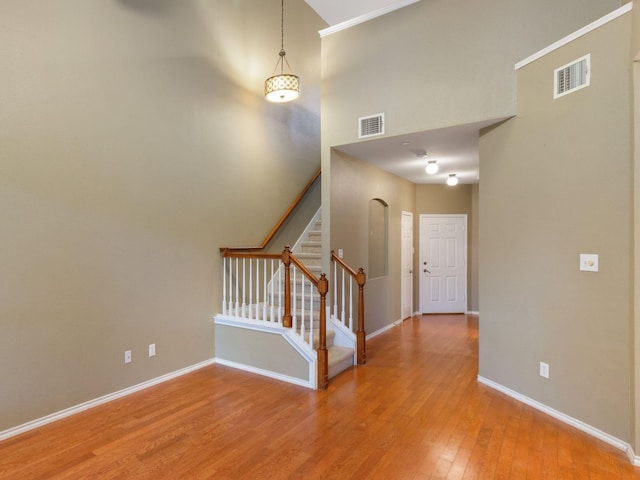 staircase featuring hardwood / wood-style floors