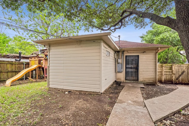 view of outbuilding featuring a playground