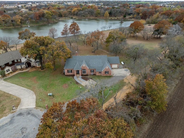 drone / aerial view featuring a water view