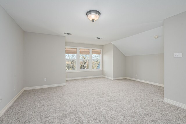 rear view of property featuring a yard and a sunroom