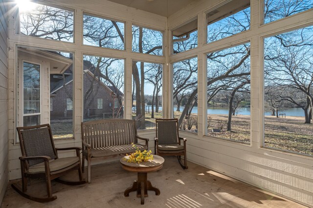 unfurnished living room with crown molding, a fireplace, dark hardwood / wood-style floors, and ceiling fan