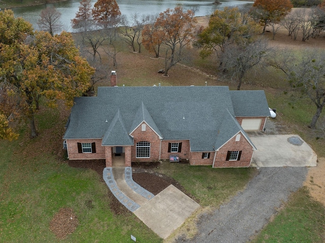 bird's eye view with a water view