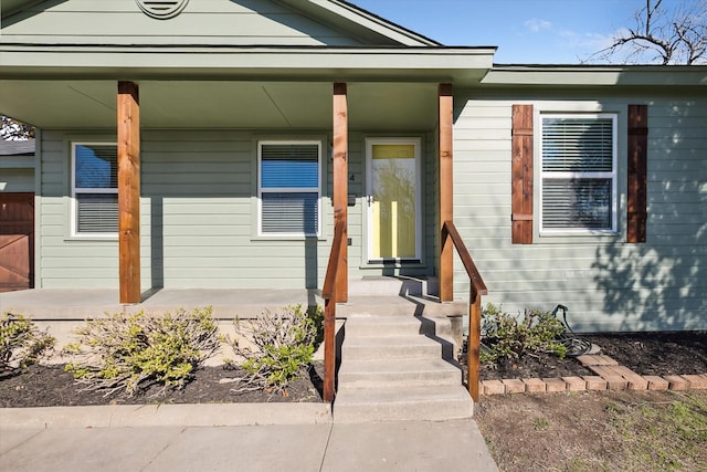 entrance to property with covered porch