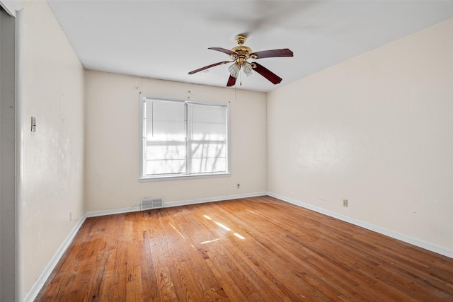 unfurnished room featuring ceiling fan and light hardwood / wood-style flooring