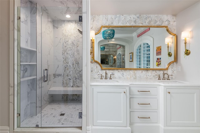 bathroom featuring walk in shower and vanity