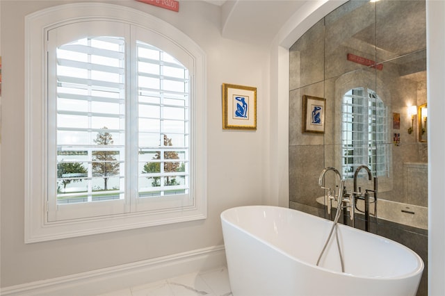 bathroom with a tub