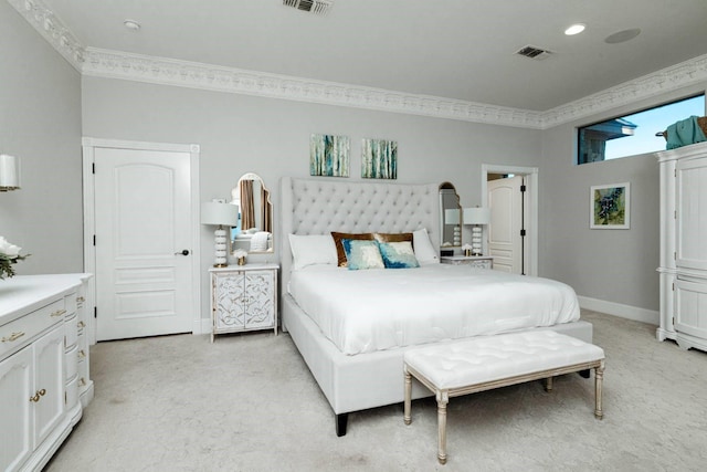 carpeted bedroom with crown molding