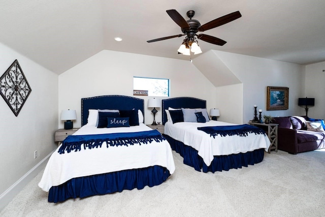 carpeted bedroom featuring ceiling fan and lofted ceiling