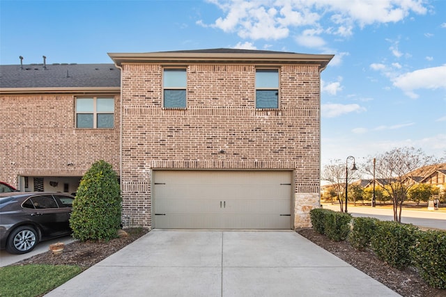 exterior space with a garage